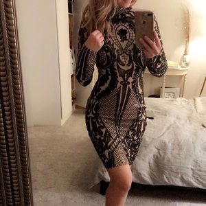 Catwalk connections nude black mini dress